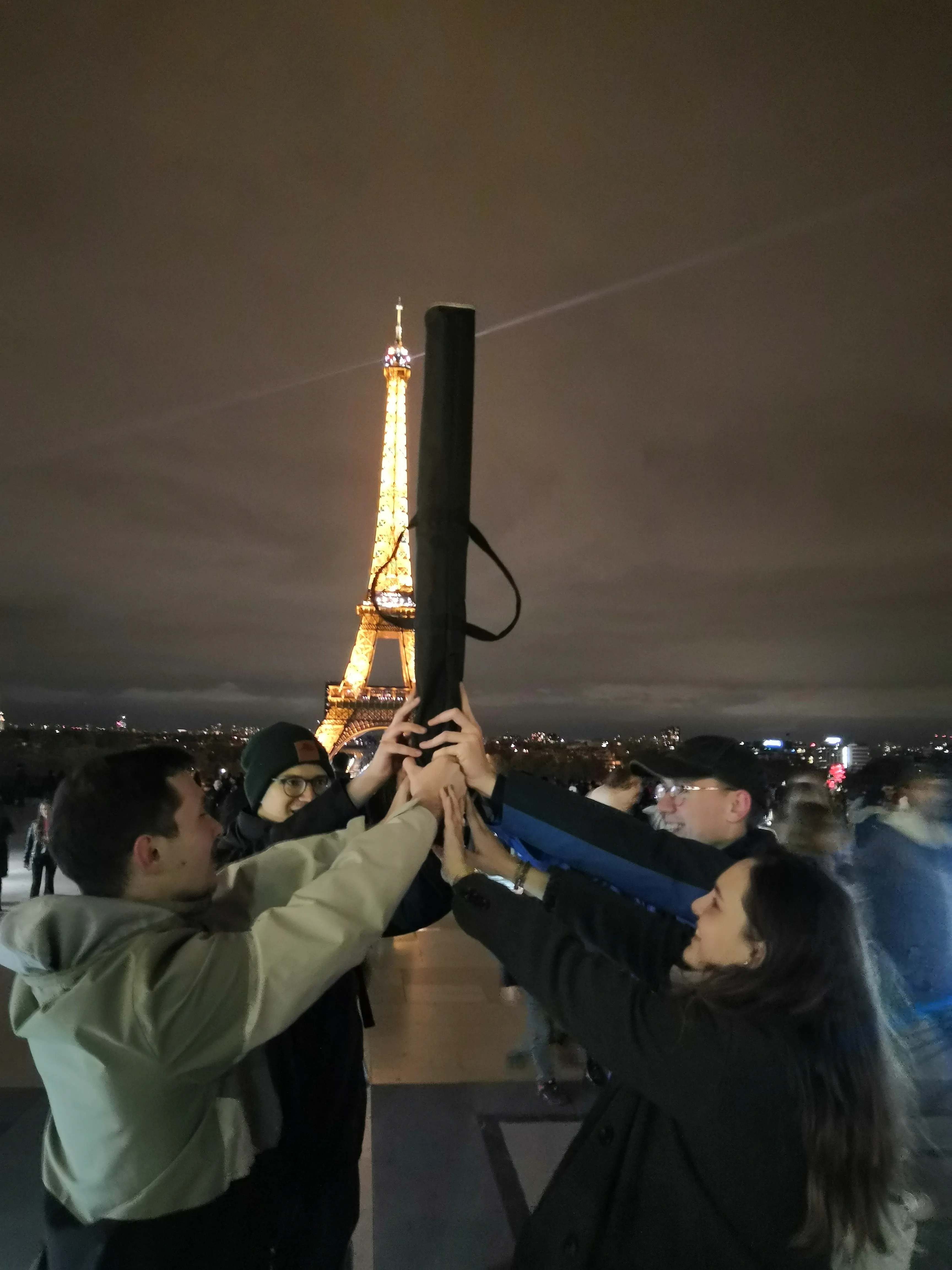 TRAPS members posing in front of the Eiffel tower.