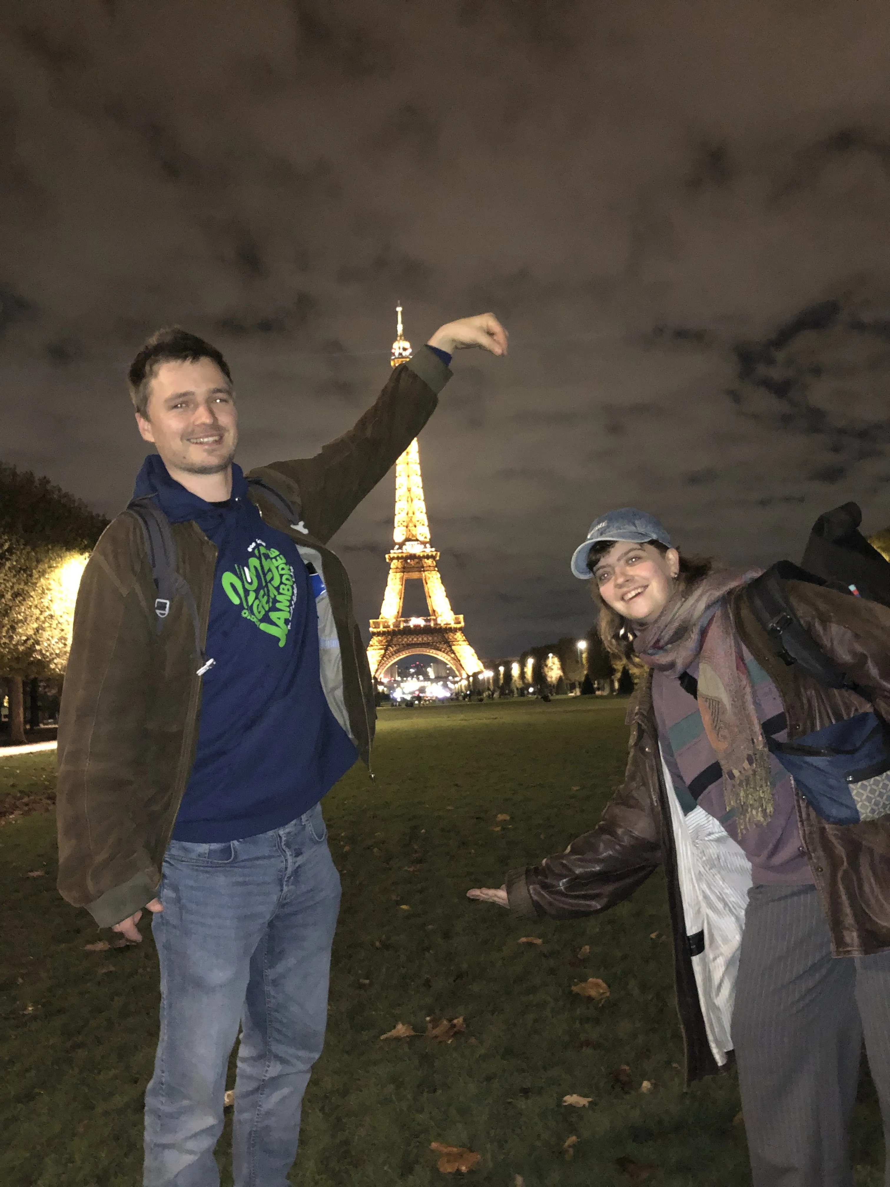 Two TRAPS members try to make it look like they are holding the Eiffel tower up.