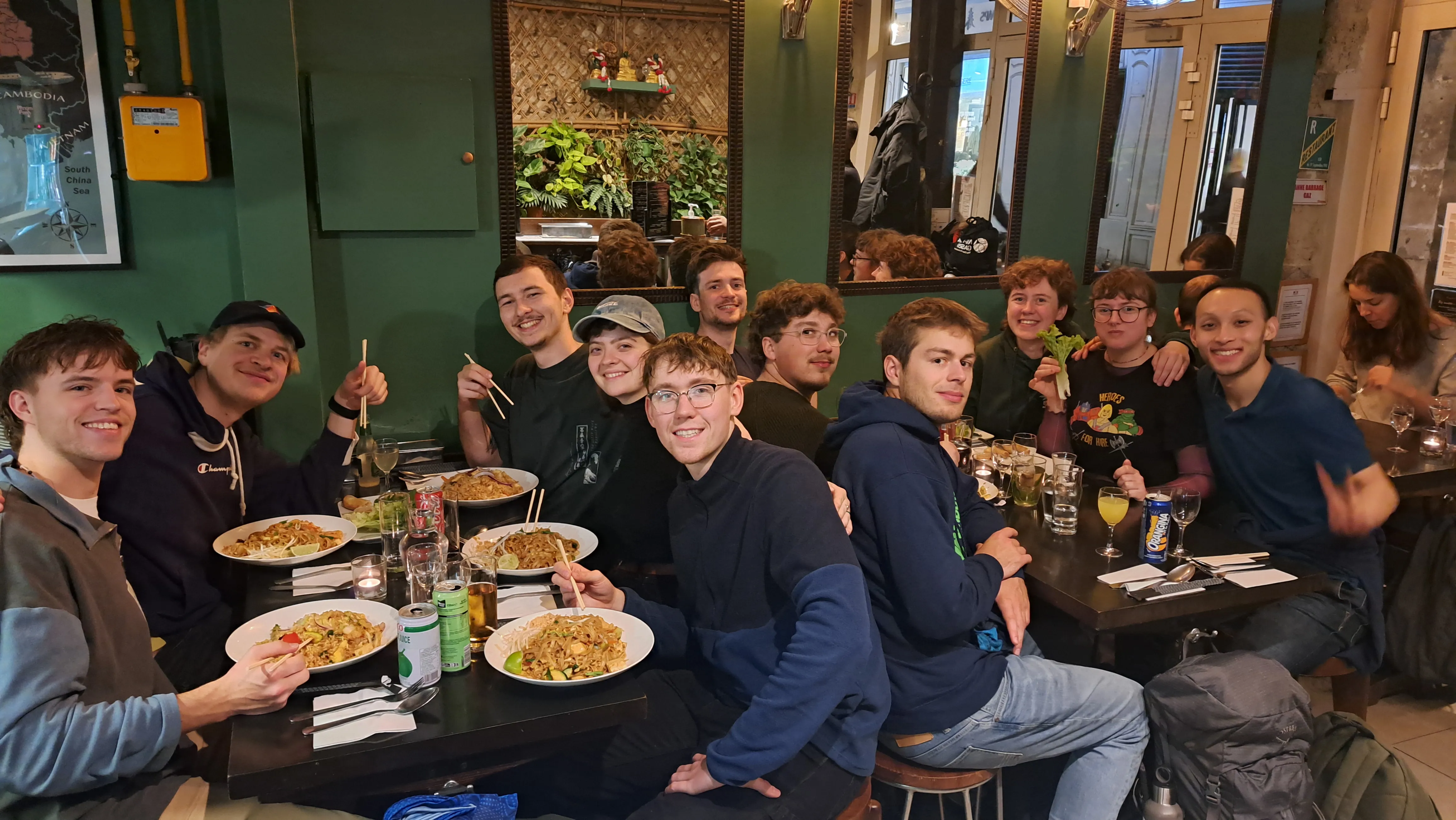 TRAPS members sitting at tables and eating dinner