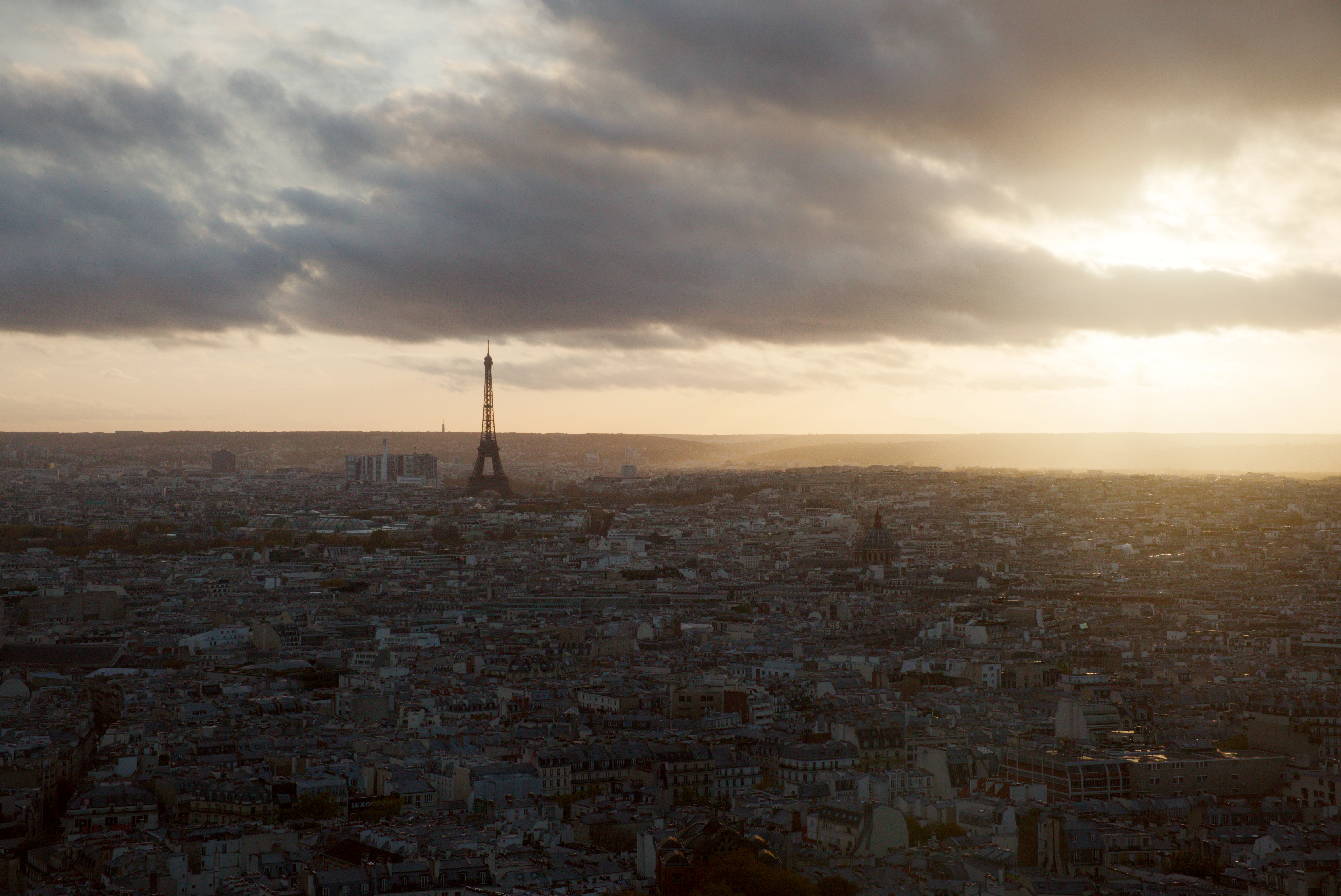 Early sunset with a great view from sacreceur over paris including the eiffel tower 