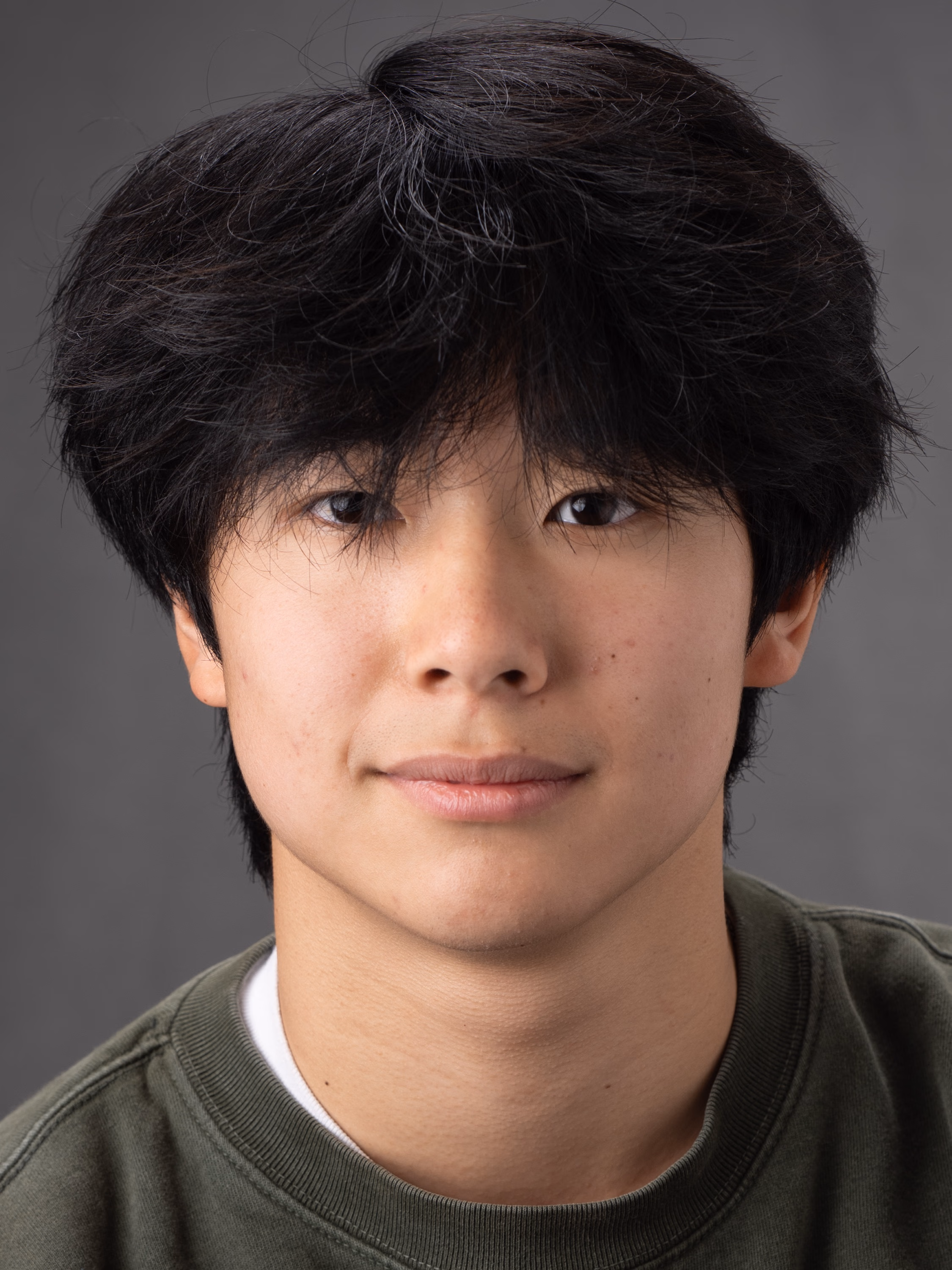 Headshot of Adam Cheong.