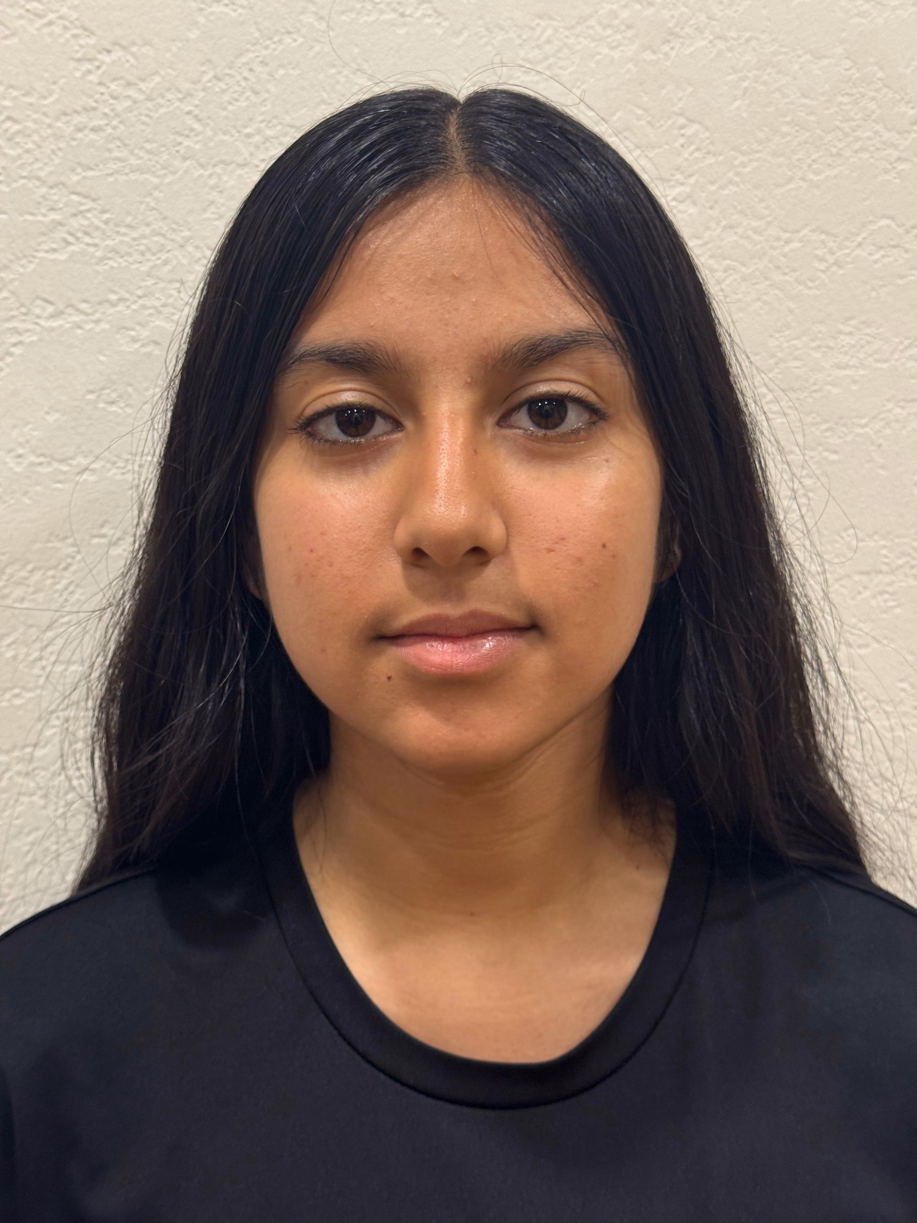 Headshot of Jashna Oza.